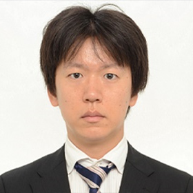 飯田 賢 氏