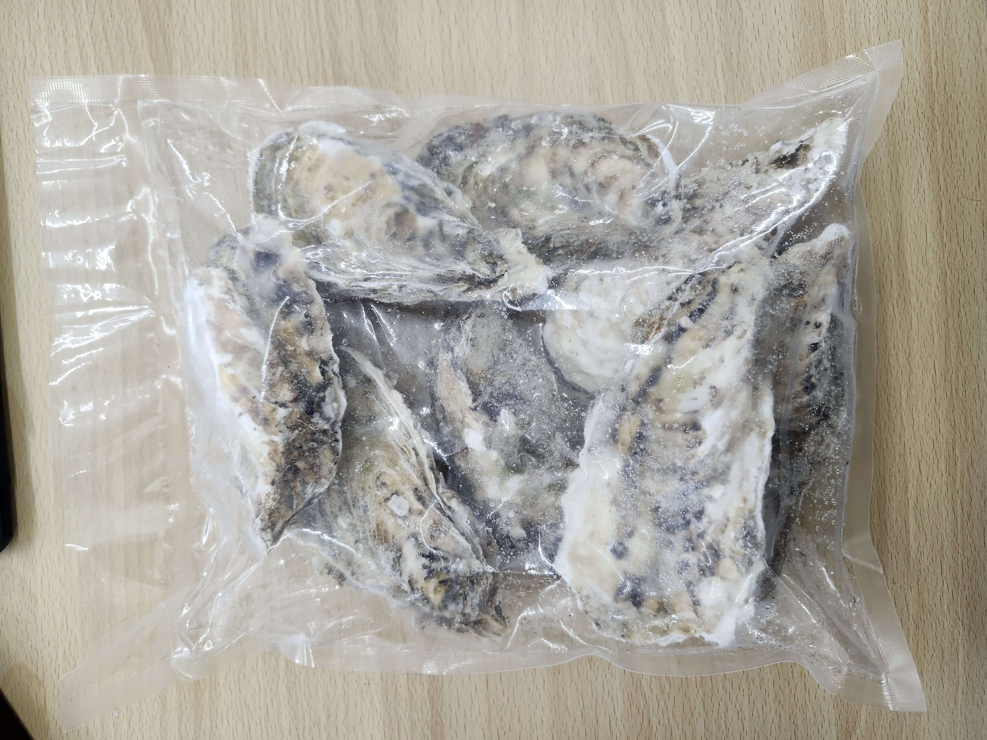 宮城県・岩手県産　冷凍殻付き牡蠣　1㎏袋入/2㎏袋入